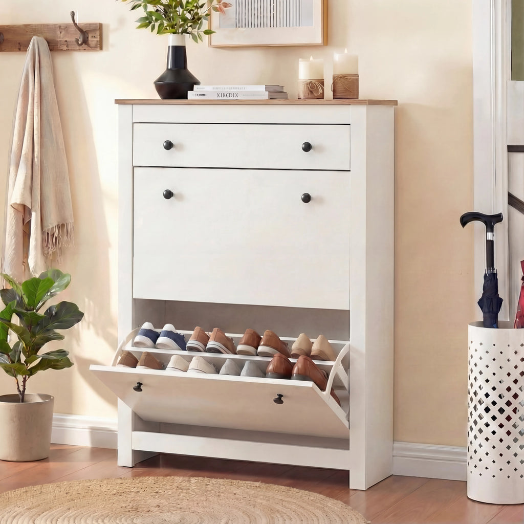 [White] Hallway shoe storage unit with bottom door open displaying pairs on built-in racks beside umbrella stand