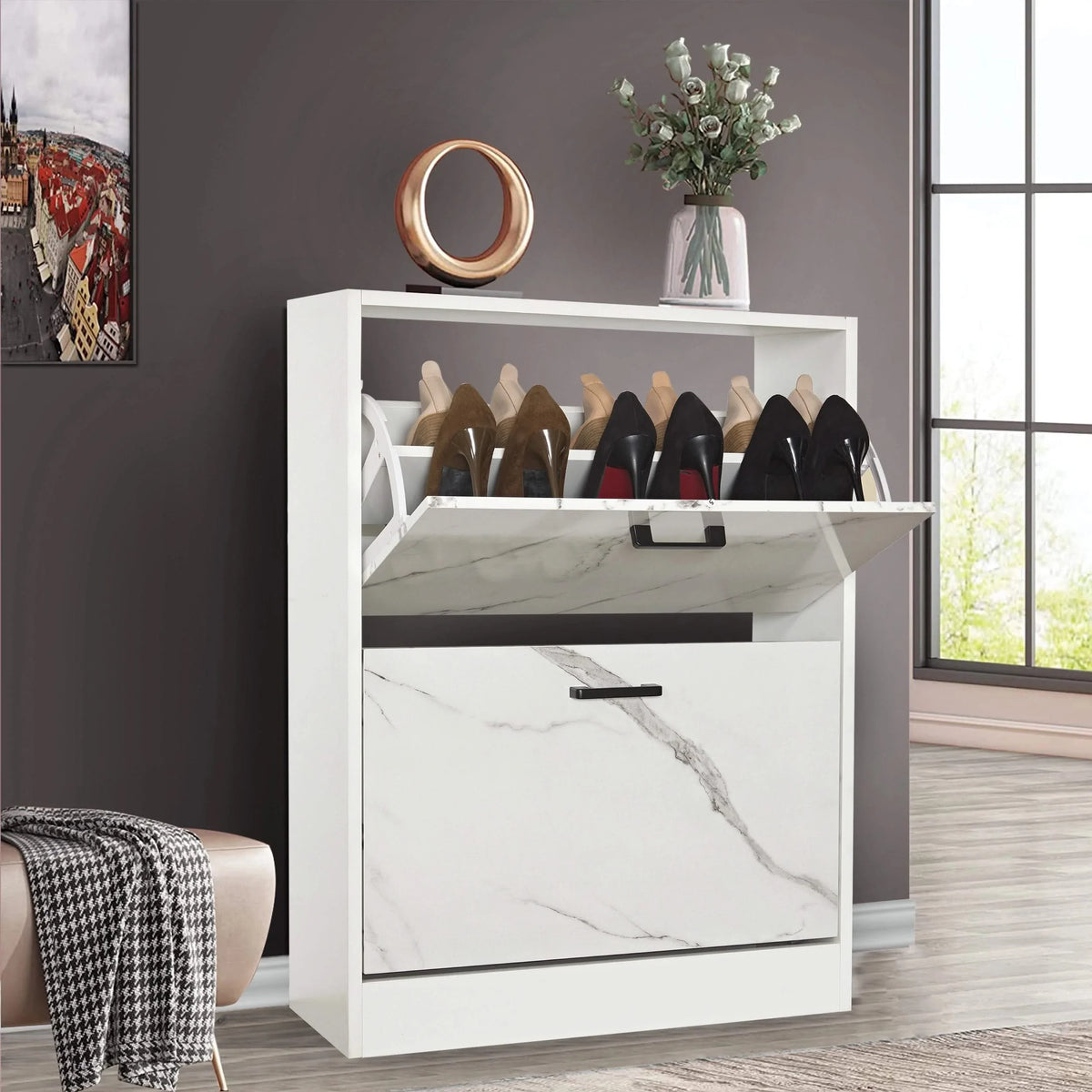 [Black Marble] This 12 pair shoe storage cabinet features a black marble pull-down drawer open at the bottom, revealing boots and sneakers.